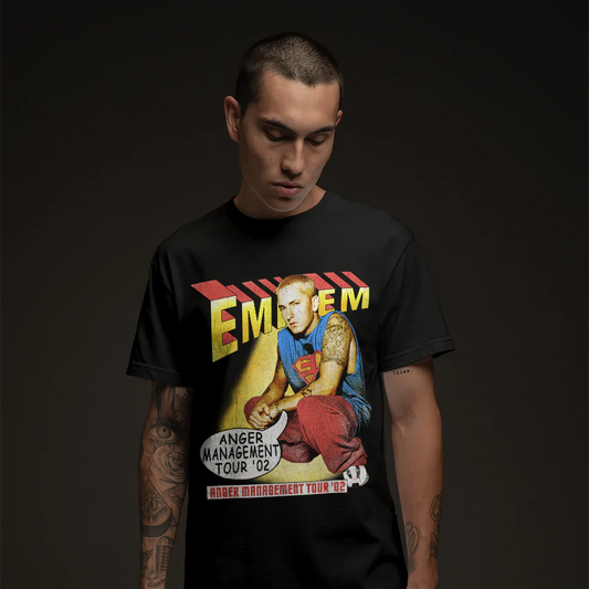 Model wears vintage Anger Management Tour 2002 T-Shirt, featuring Eminem as a superhero with tour dates.
