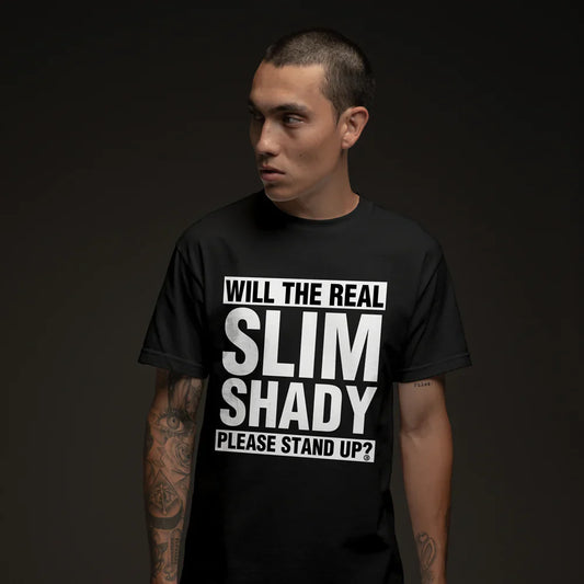 Model wearing Eminem 'Please Stand Up' T-shirt featuring bold white text from the iconic song on a black background, exemplifying the rebellious spirit of Slim Shady.